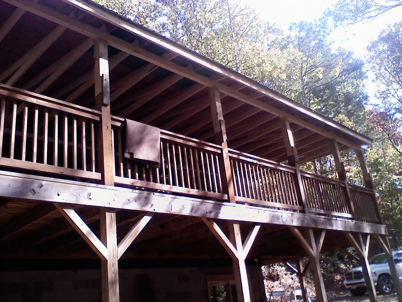 Timber framing under a new elevated porch and deck — Roof Leak Repair in Jewett by Roofing Brothers